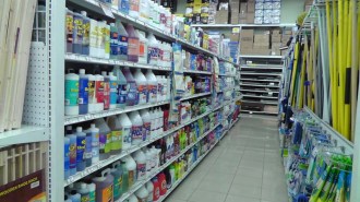 The cleaning aisle with about any cleaning product you could imagine, as well as mops, brooms, sponges and brushes.