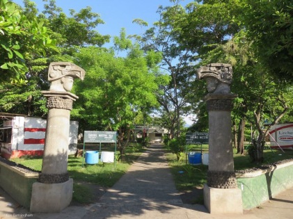 The city park with interesting pillars at the corner.
