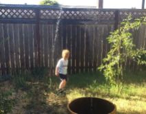 A broken sprinkler head that makes a fountain is great fun on a warm summer day