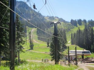 The chair lifts were going. We were told that one could ride them up and down all you want if you buy a pass. There were people walking down, and many mountain bikers who went up and then rode their rented bikes down.